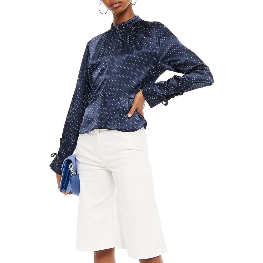 Gianni Tie-back cutout polka-dot satin peplum blouse